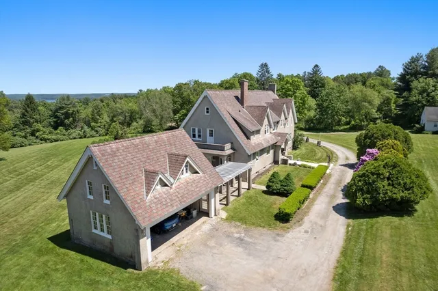 an aerial view of a house with a garden