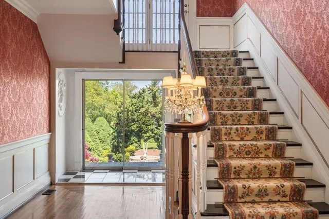 a view of entryway with wooden floor