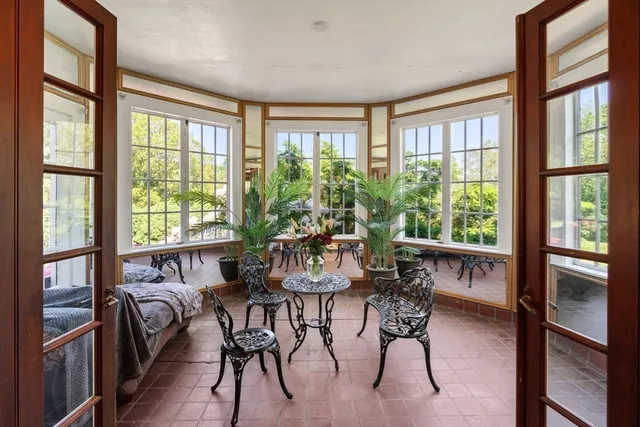 a view of a dining room with furniture window and outside view