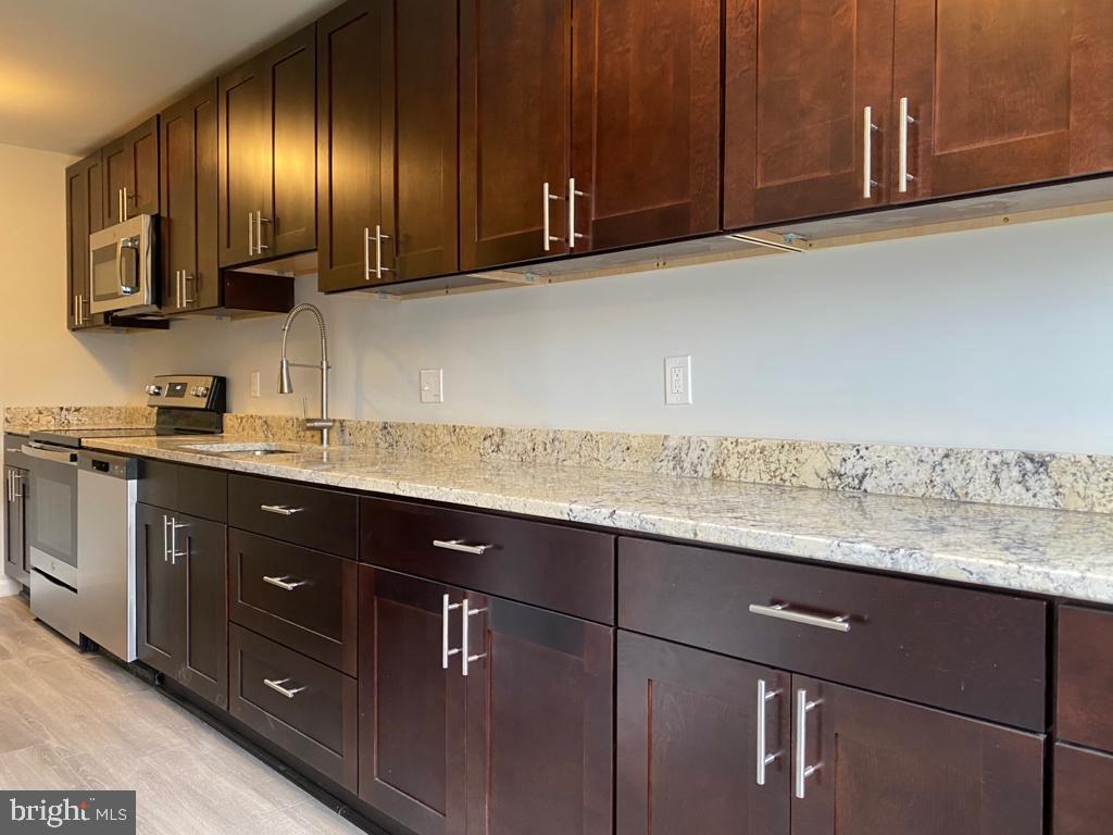 15714 Dorset Road, Unit 201 Laurel, MD 20707 - Photo 1 of 14 KITCHEN