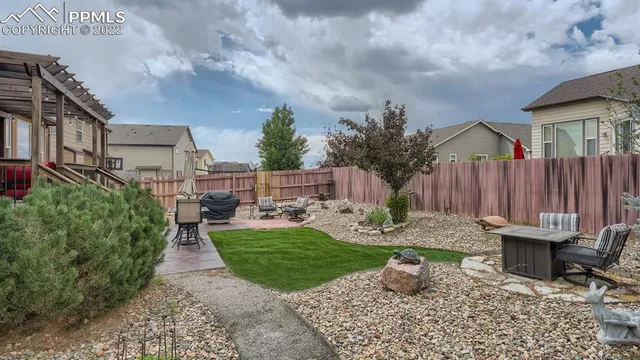 a view of outdoor space yard deck patio and fire pit
