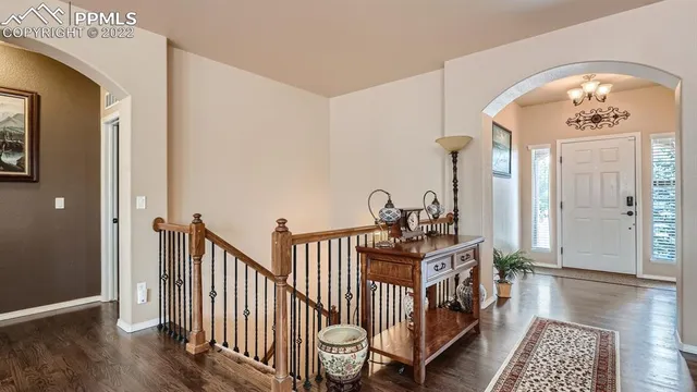 a view of entryway with wooden floor