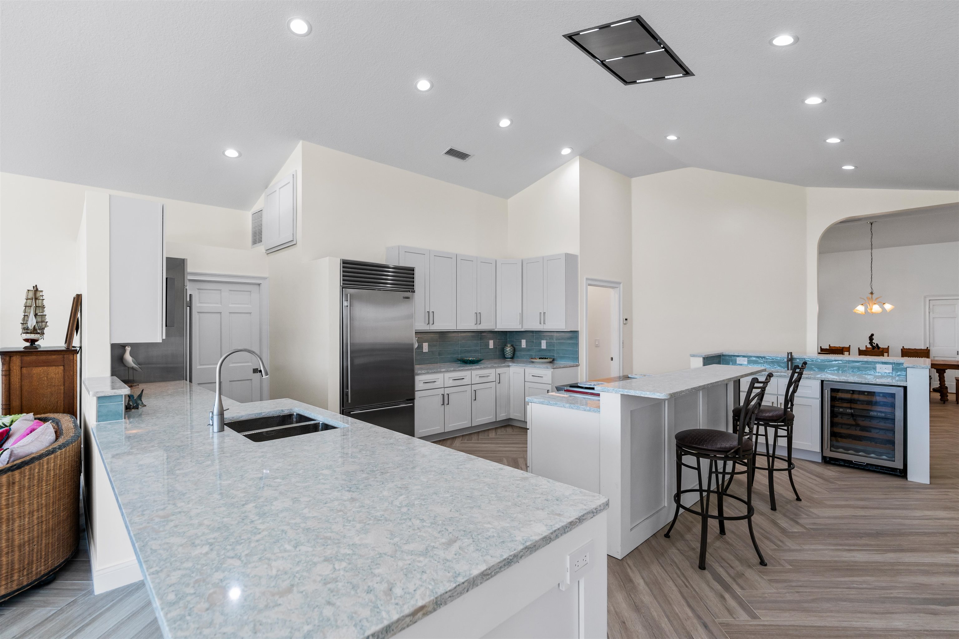 318 Marsh Point Circle St. Augustine, FL 32080 - Photo 11 of 44 a kitchen with refrigerator and chairs