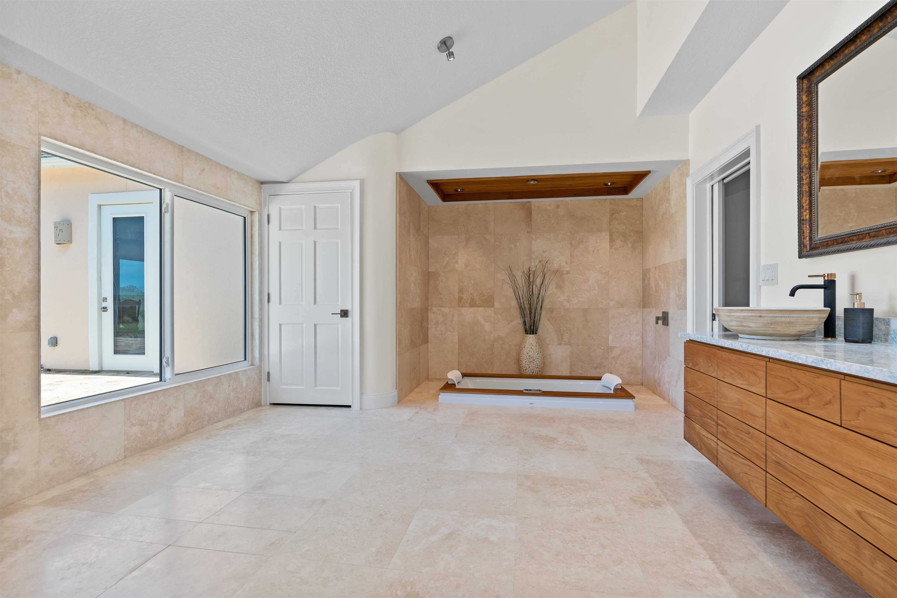 318 Marsh Point Circle St. Augustine, FL 32080 - Photo 21 of 44 a view of an empty room with window and cabinet area