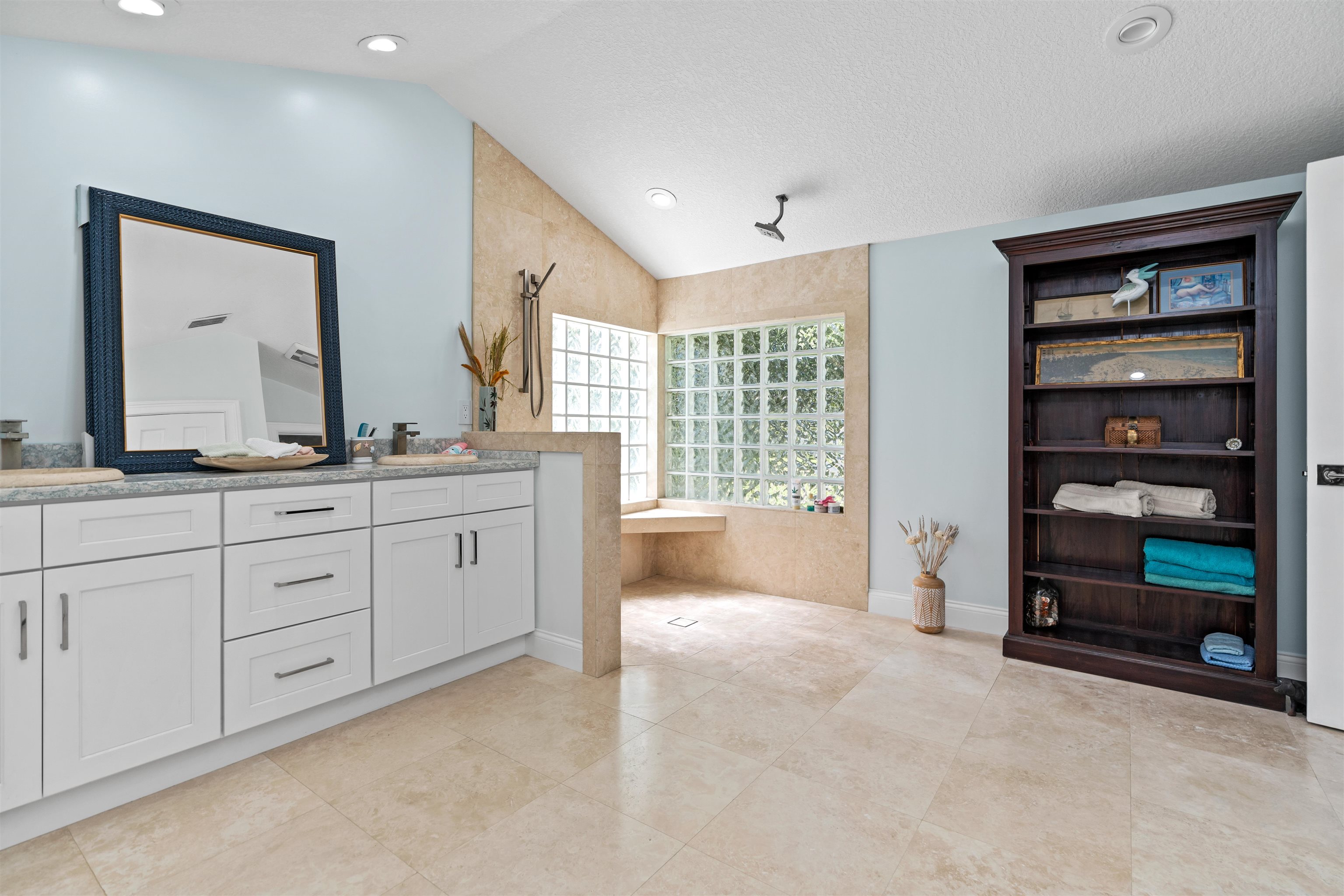 318 Marsh Point Circle St. Augustine, FL 32080 - Photo 32 of 44 a spacious bathroom with a granite countertop sink mirror and bathtub