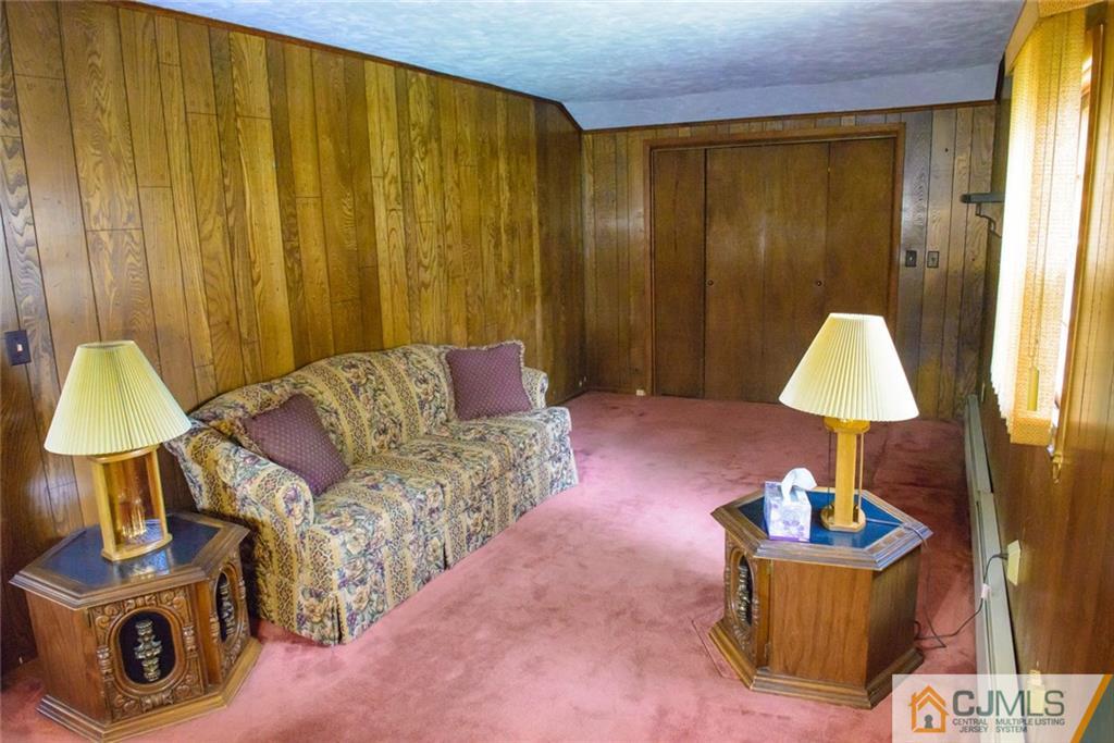 42 Colton Road Edison, NJ 08817 - Photo 5 of 6 a living room with furniture and a window