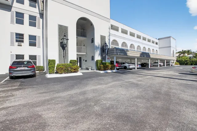 a cars parked in front of a building