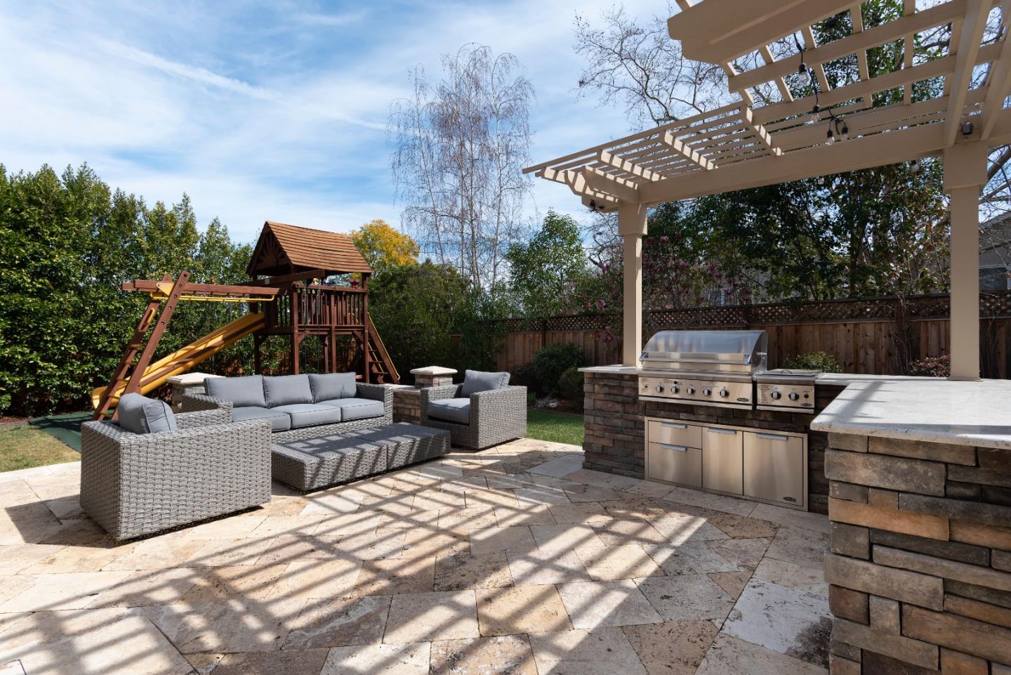 2181 Cedar Avenue Menlo Park, CA 94025 - Photo 15 of 16 a view of a terrace with couches chairs and wooden floor