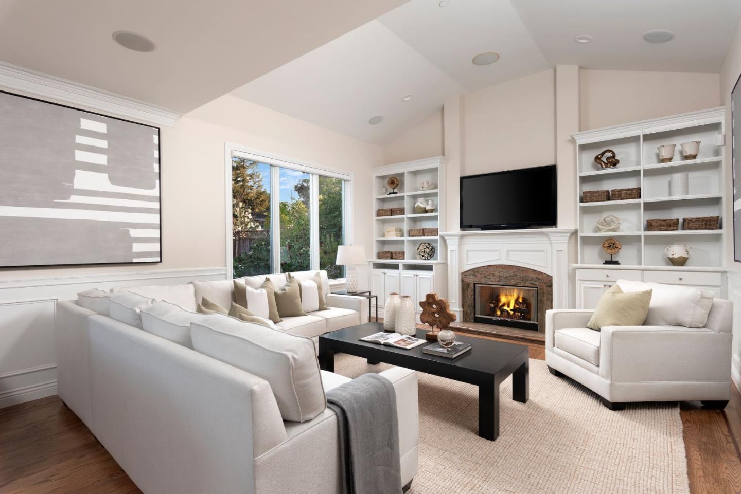 2181 Cedar Avenue Menlo Park, CA 94025 - Photo 2 of 16 a living room with furniture a fireplace and a flat screen tv