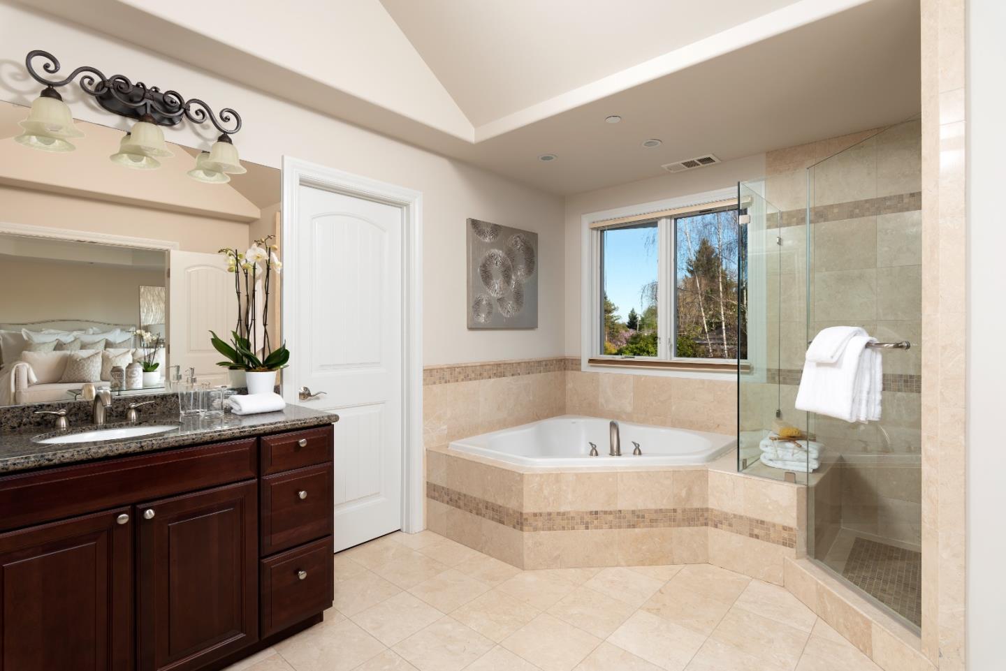 2181 Cedar Avenue Menlo Park, CA 94025 - Photo 8 of 16 a spacious bathroom with a tub sink and mirror