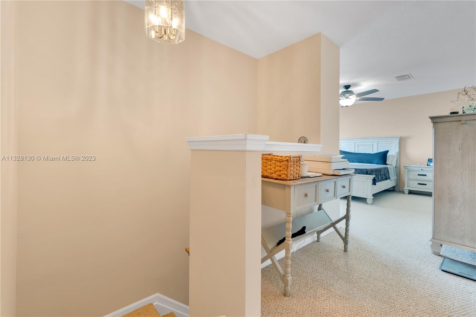 10274 Windswept Place Boca Raton, FL 33498 - Photo 15 of 33 a workspace with a table