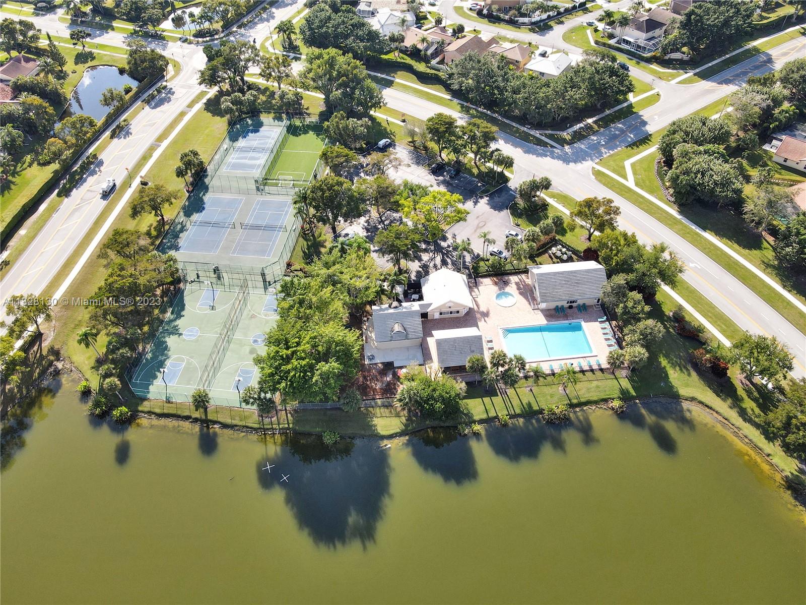 10274 Windswept Place Boca Raton, FL 33498 - Photo 28 of 33 an aerial view of house with yard swimming pool and outdoor seating