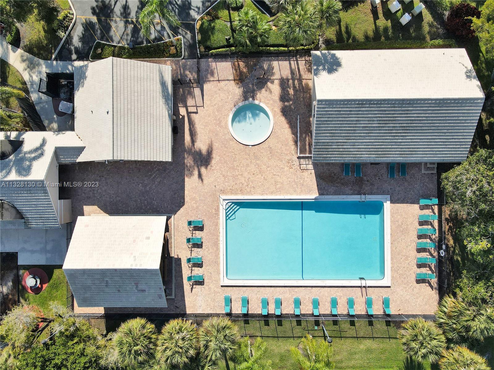 10274 Windswept Place Boca Raton, FL 33498 - Photo 29 of 33 an aerial view of a house with a swimming pool
