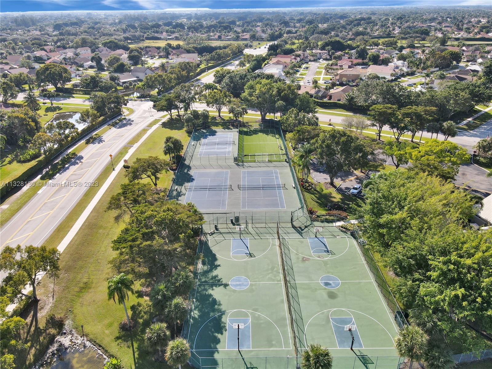 10274 Windswept Place Boca Raton, FL 33498 - Photo 32 of 33 an aerial view of residential houses with outdoor space