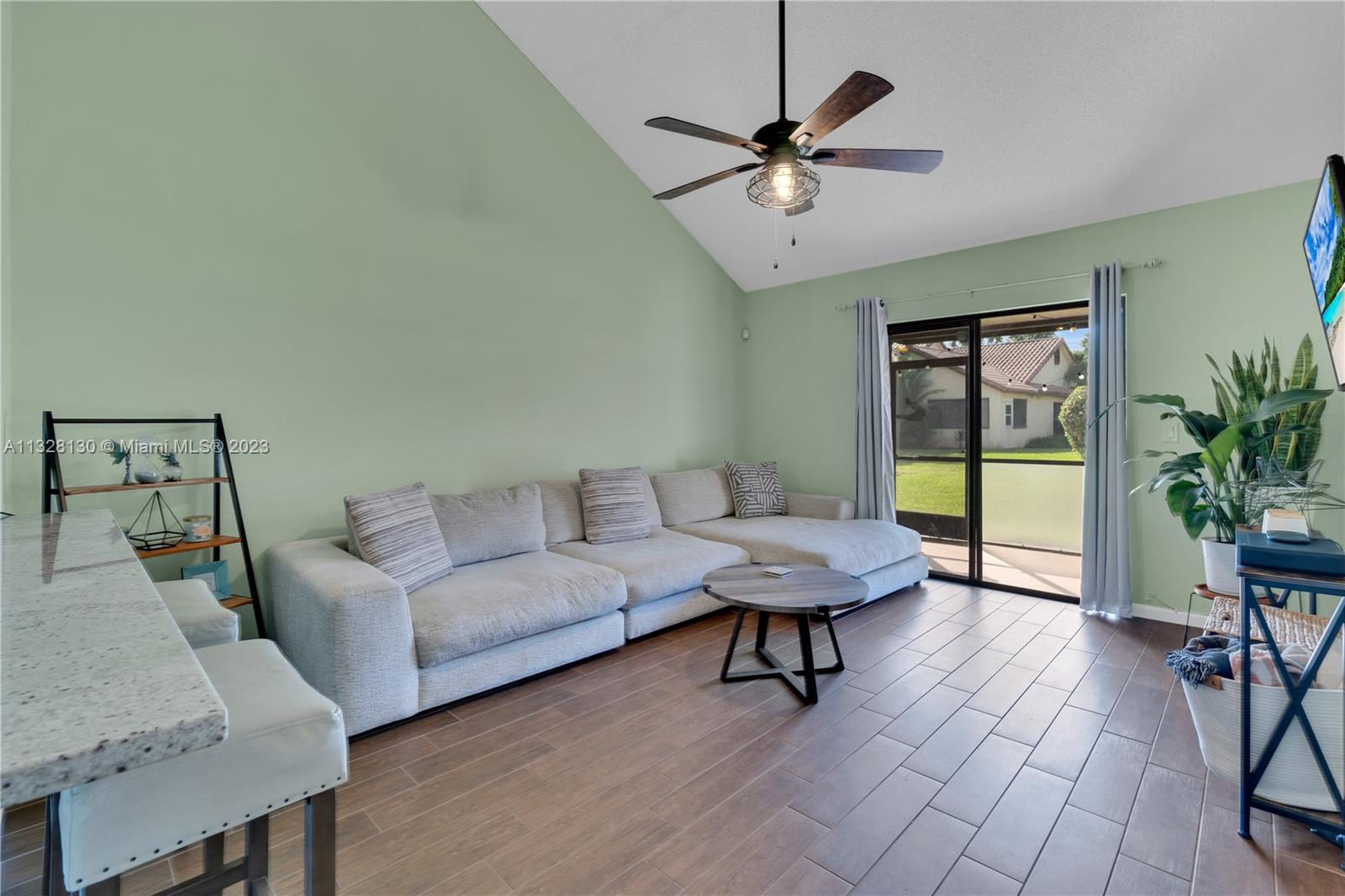 10274 Windswept Place Boca Raton, FL 33498 - Photo 8 of 33 a living room with furniture and a window