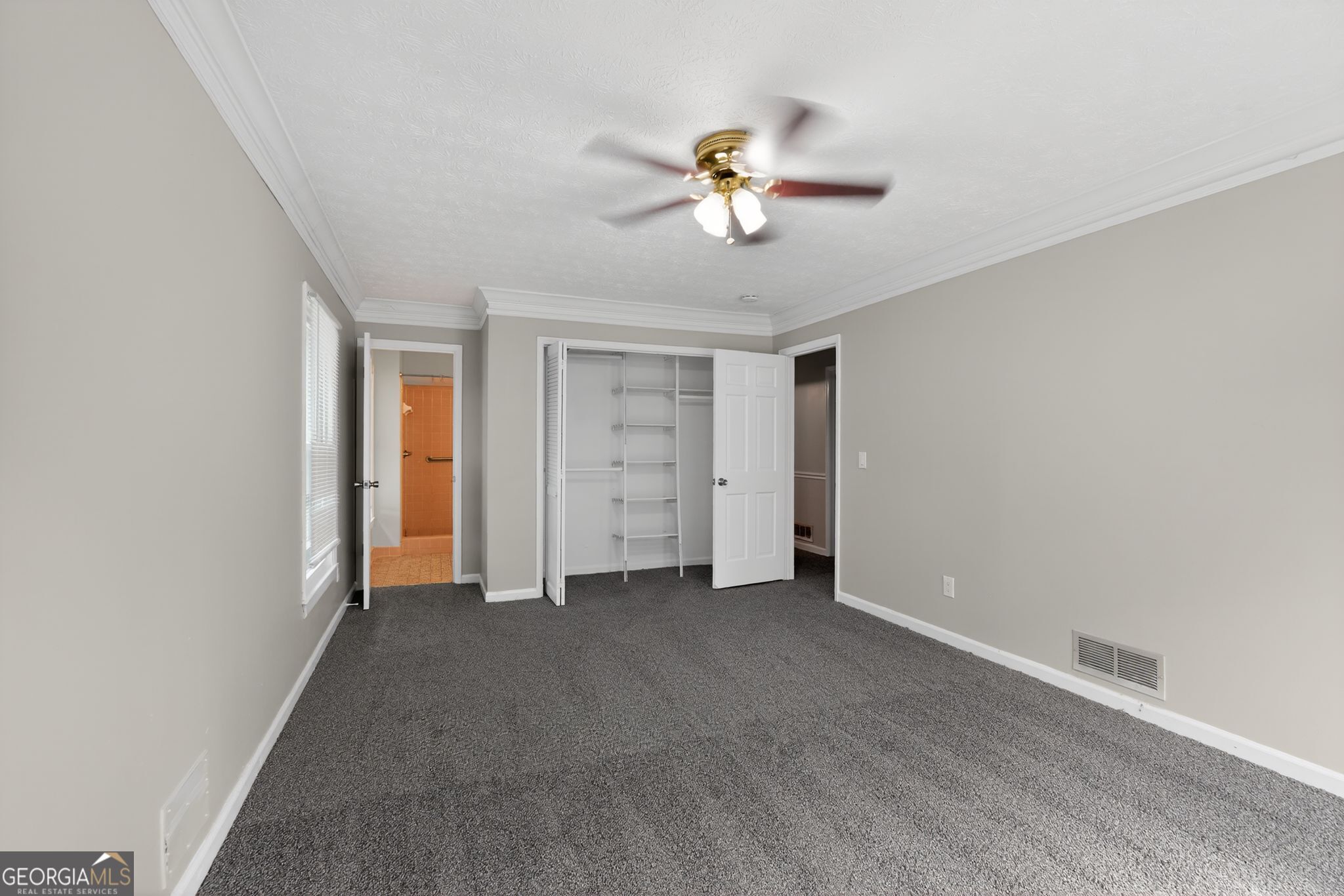 3285 Old Salem Road Southeast Conyers, GA 30013 - Photo 28 of 33 a view of an empty room with chandelier fan