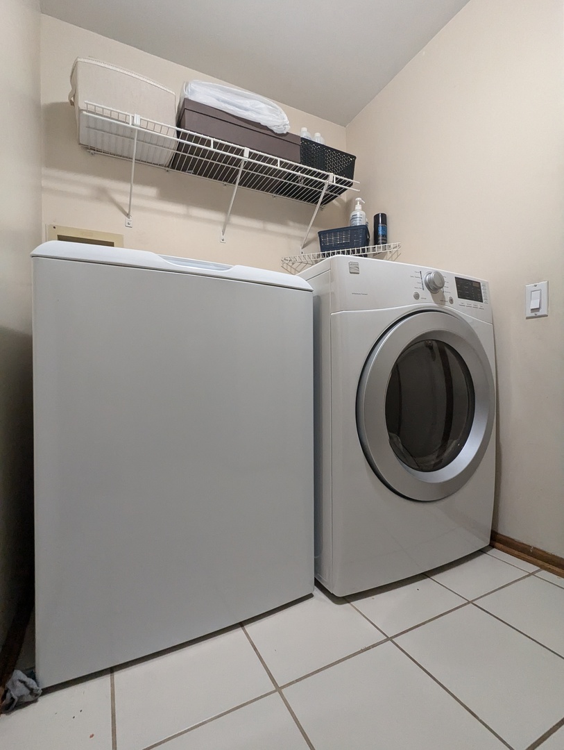 1466 Garnet Circle Hoffman Estates, IL 60192 - Photo 18 of 23 a utility room with dryer and washer