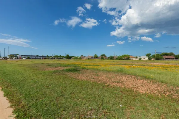 a view of an ocean and city