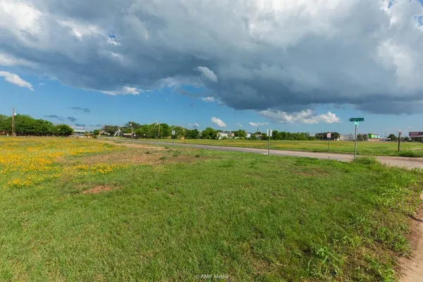 a view of a town with big yard