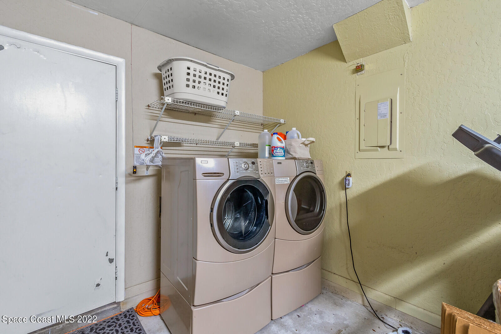 1784 Quail Trail Melbourne, FL 32935 - Photo 34 of 40 a utility room with dryer and washer