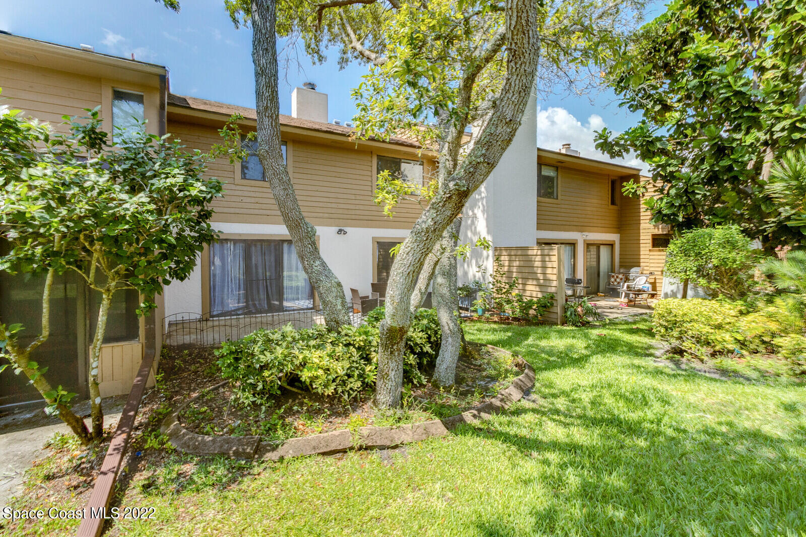 1784 Quail Trail Melbourne, FL 32935 - Photo 7 of 40 front view of a house with a yard