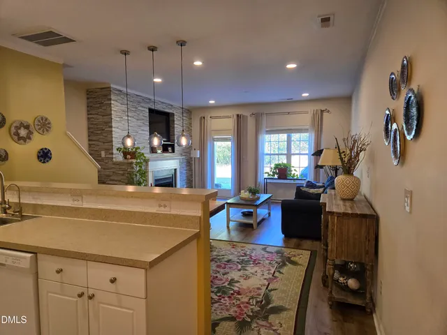 a very nice looking living room with a large window