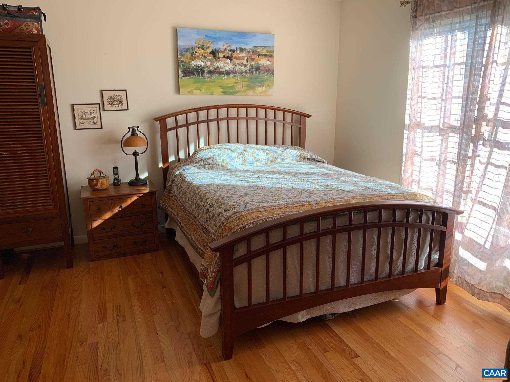 5305 Hoover Road Reva, VA 22735 - Photo 13 of 46 a bed sitting in a bedroom next to a window