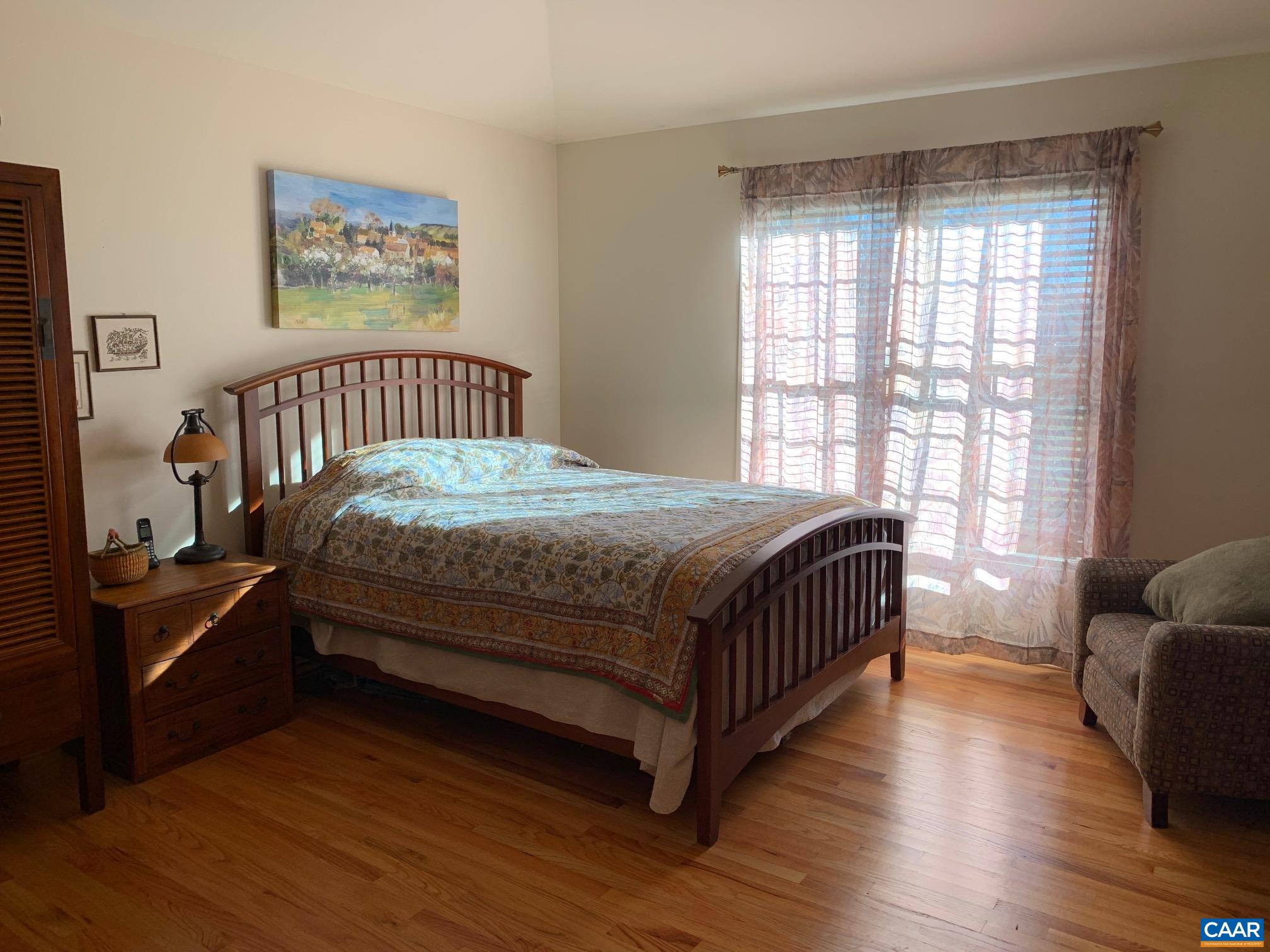 5305 Hoover Road Reva, VA 22735 - Photo 14 of 46 a bedroom with a bed and wooden floor