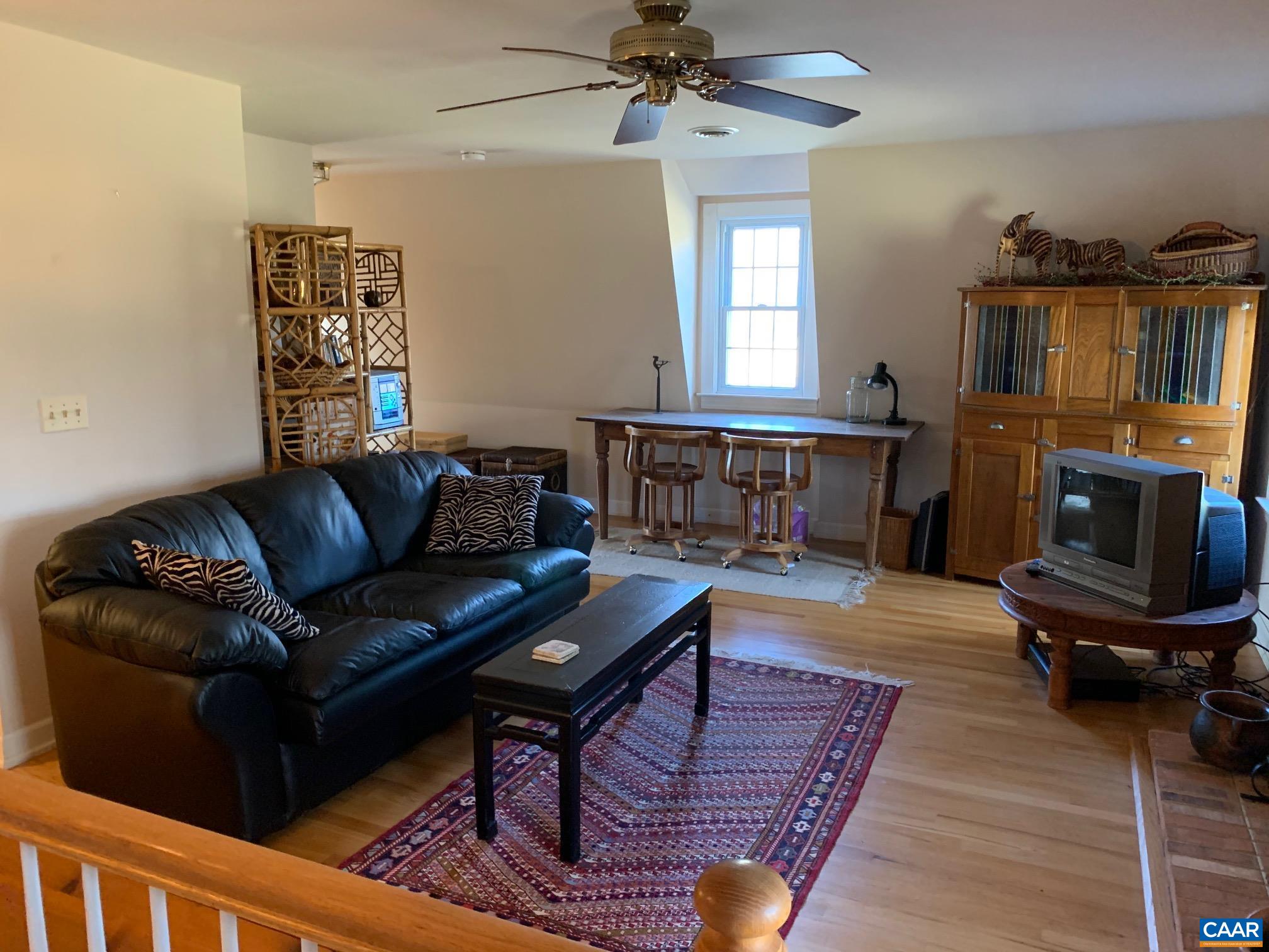 5305 Hoover Road Reva, VA 22735 - Photo 21 of 46 a living room with furniture and a wooden floor