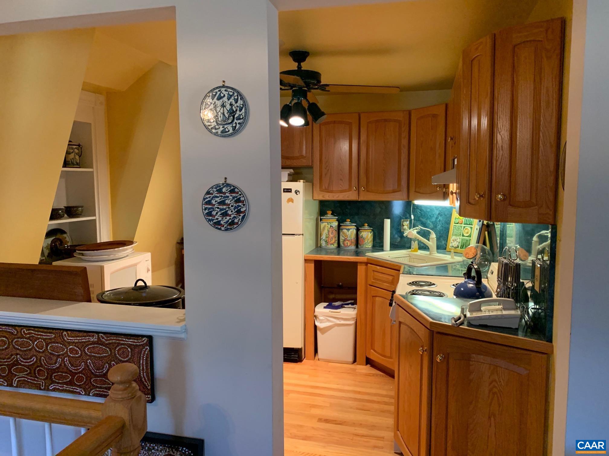 5305 Hoover Road Reva, VA 22735 - Photo 26 of 46 a kitchen with a refrigerator and a stove