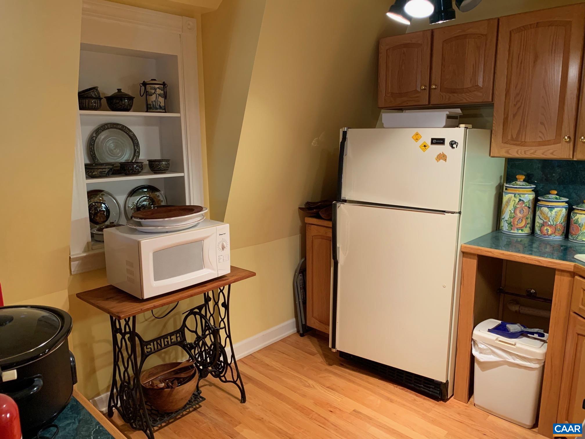 5305 Hoover Road Reva, VA 22735 - Photo 28 of 46 a white refrigerator freezer sitting in a kitchen