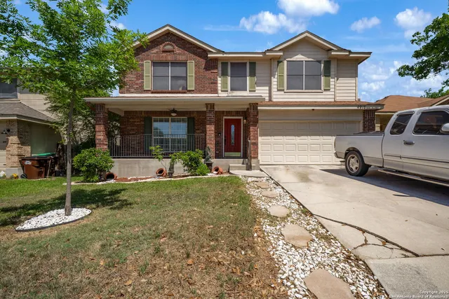 a house view with a garden space