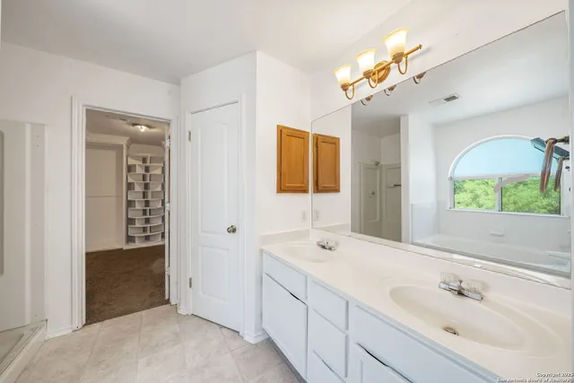 a white bath tub sitting next to a window