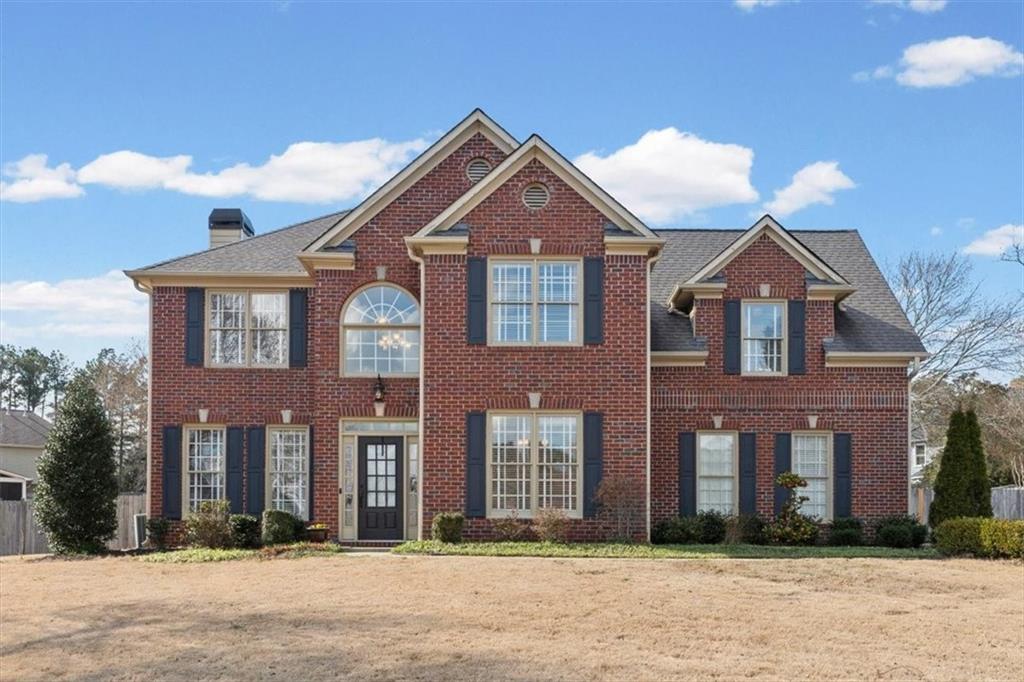 2850 Gentry Walk Court Cumming, GA 30041 - Photo 1 of 1 a front view of a house