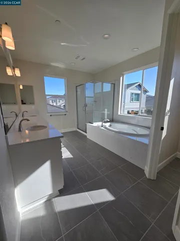 a kitchen with a sink and a stove top oven