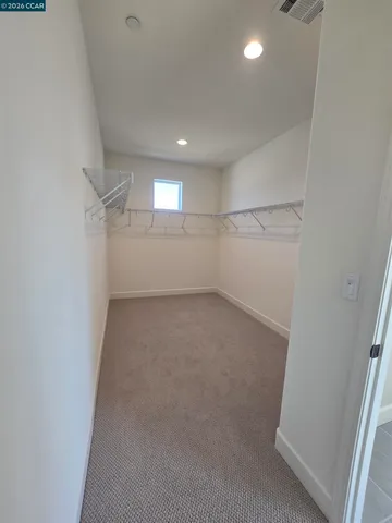 en empty room with windows