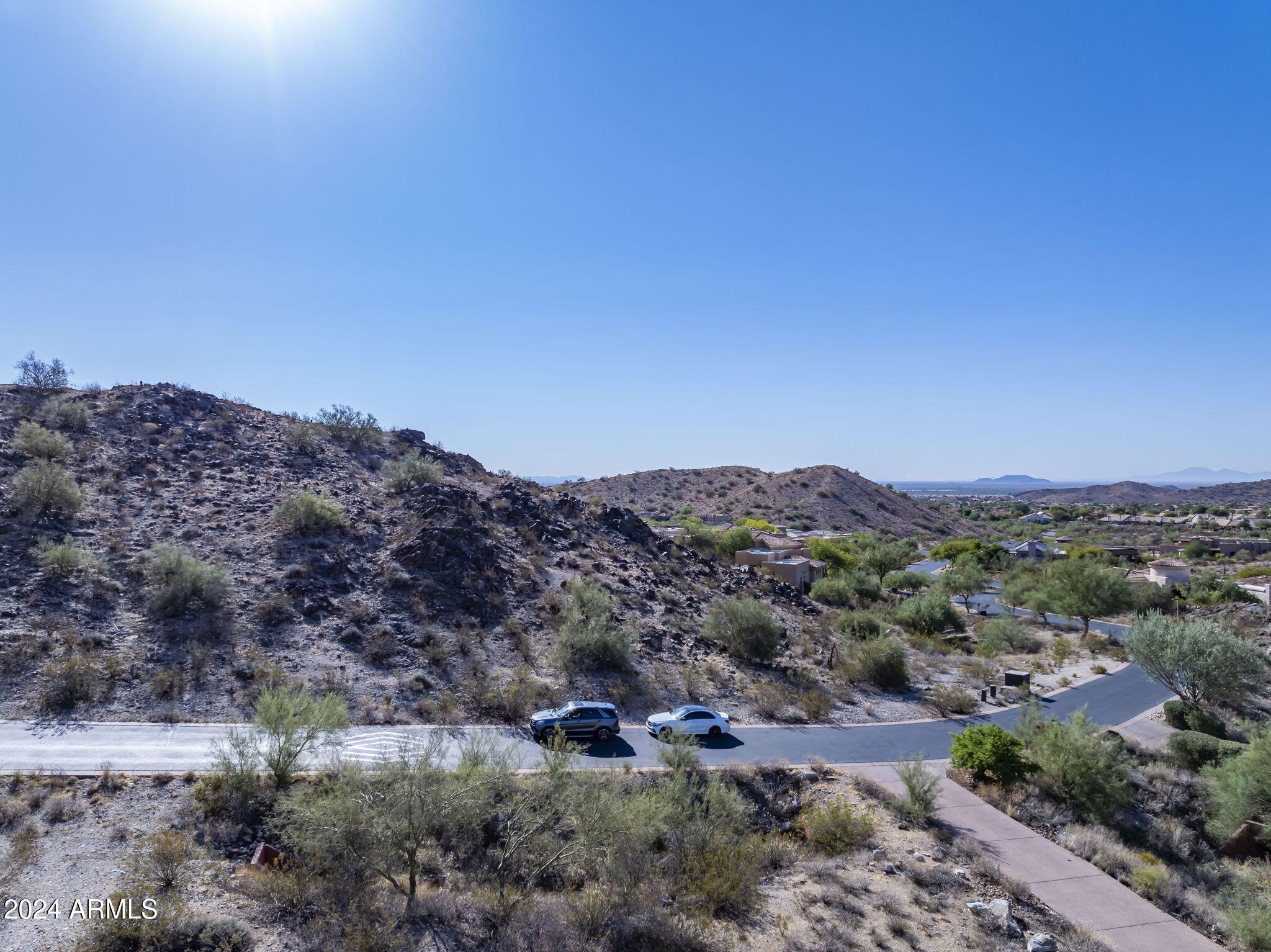 14008 South Rockhill Road, Unit 40 Phoenix, AZ 85048 - Photo 4 of 31 a view of a dry field