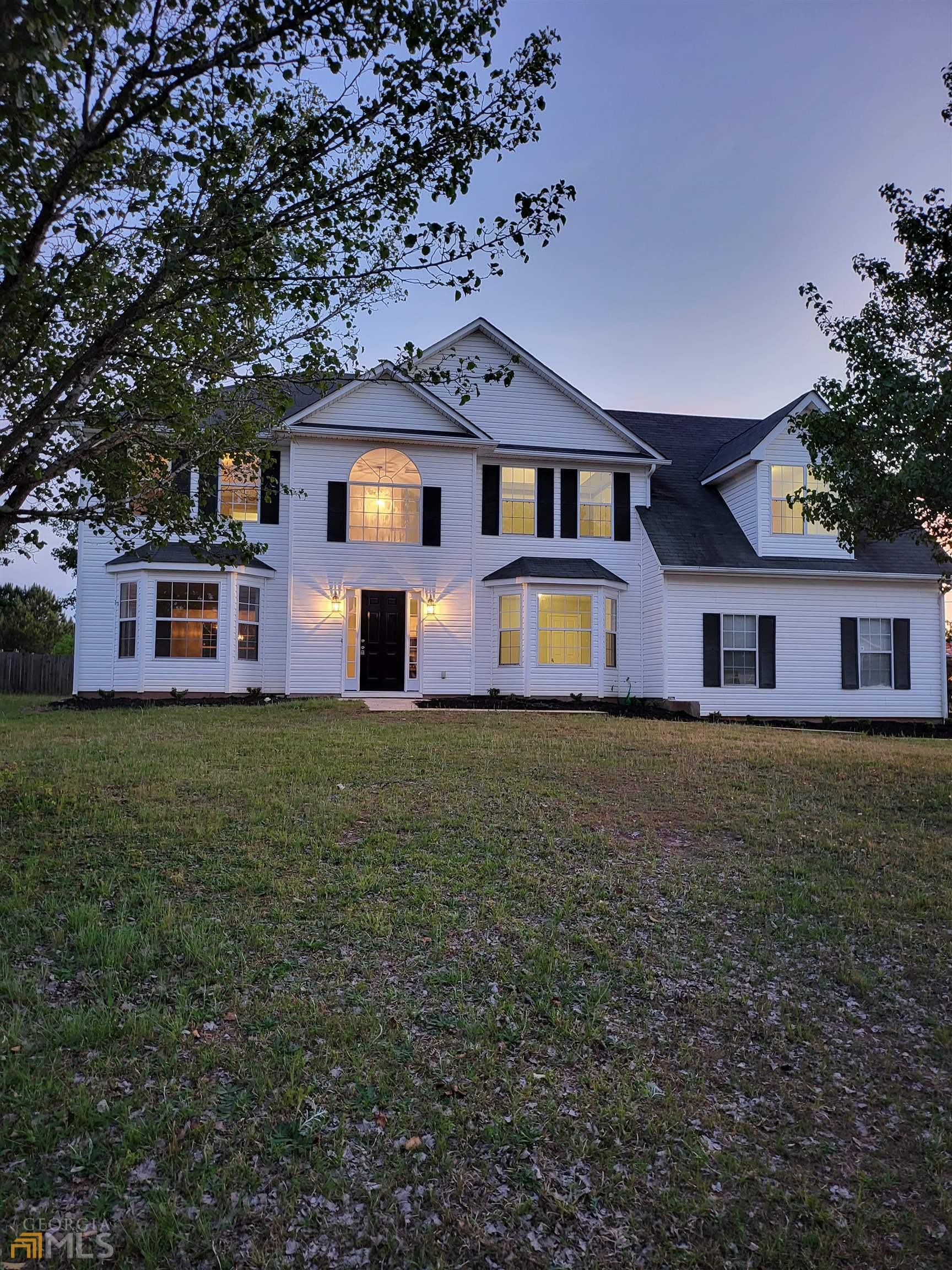 2313 Bankside Circle Decatur, GA 30035 - Photo 1 of 1 a front view of house with yard and trees