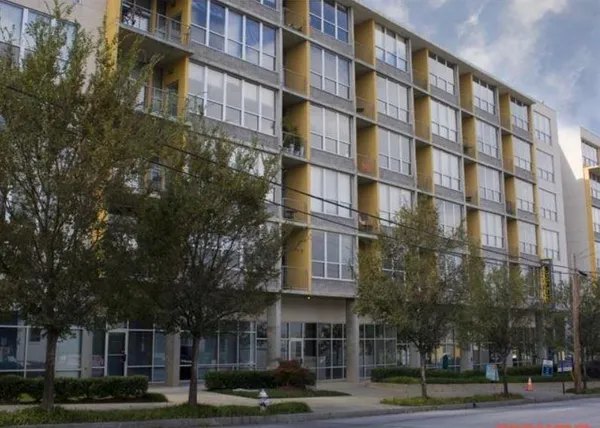 a view of a building and a street