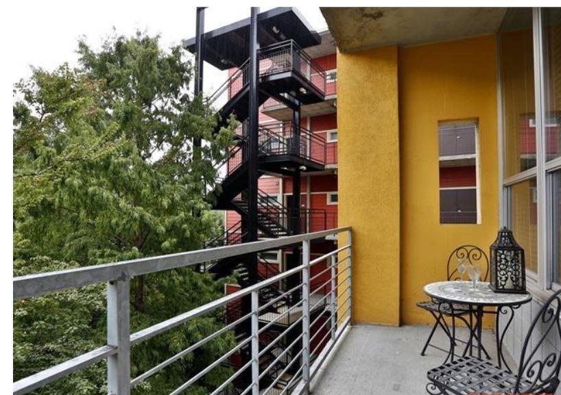 1016 Howell Mill Road, Unit 4604 Atlanta, GA 30318 - Photo 11 of 19 a view of a balcony with chairs