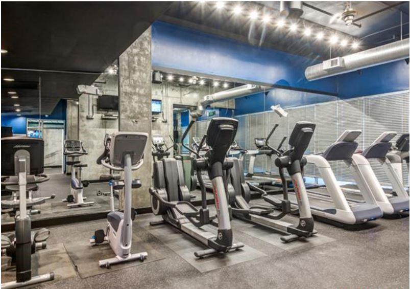 1016 Howell Mill Road, Unit 4604 Atlanta, GA 30318 - Photo 14 of 19 a view of a room with gym equipment