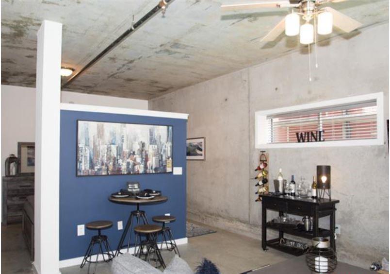 1016 Howell Mill Road, Unit 4604 Atlanta, GA 30318 - Photo 5 of 19 a dining room with furniture and window