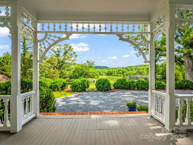 a view of swimming pool with a patio