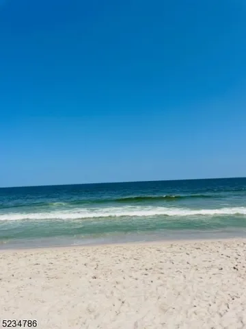 a view of a room with a wooden floor