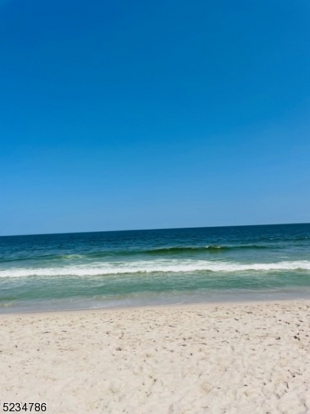 19 Haddonfield Avenue, Unit 1 Lavallette, NJ 08735 - Photo 12 of 13 a view of a room with a wooden floor