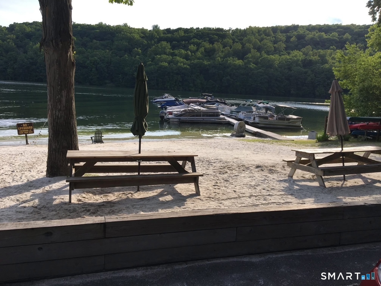 36 Maple Drive New Milford, CT 06776 - Photo 21 of 24 a view of a lake with a mountain