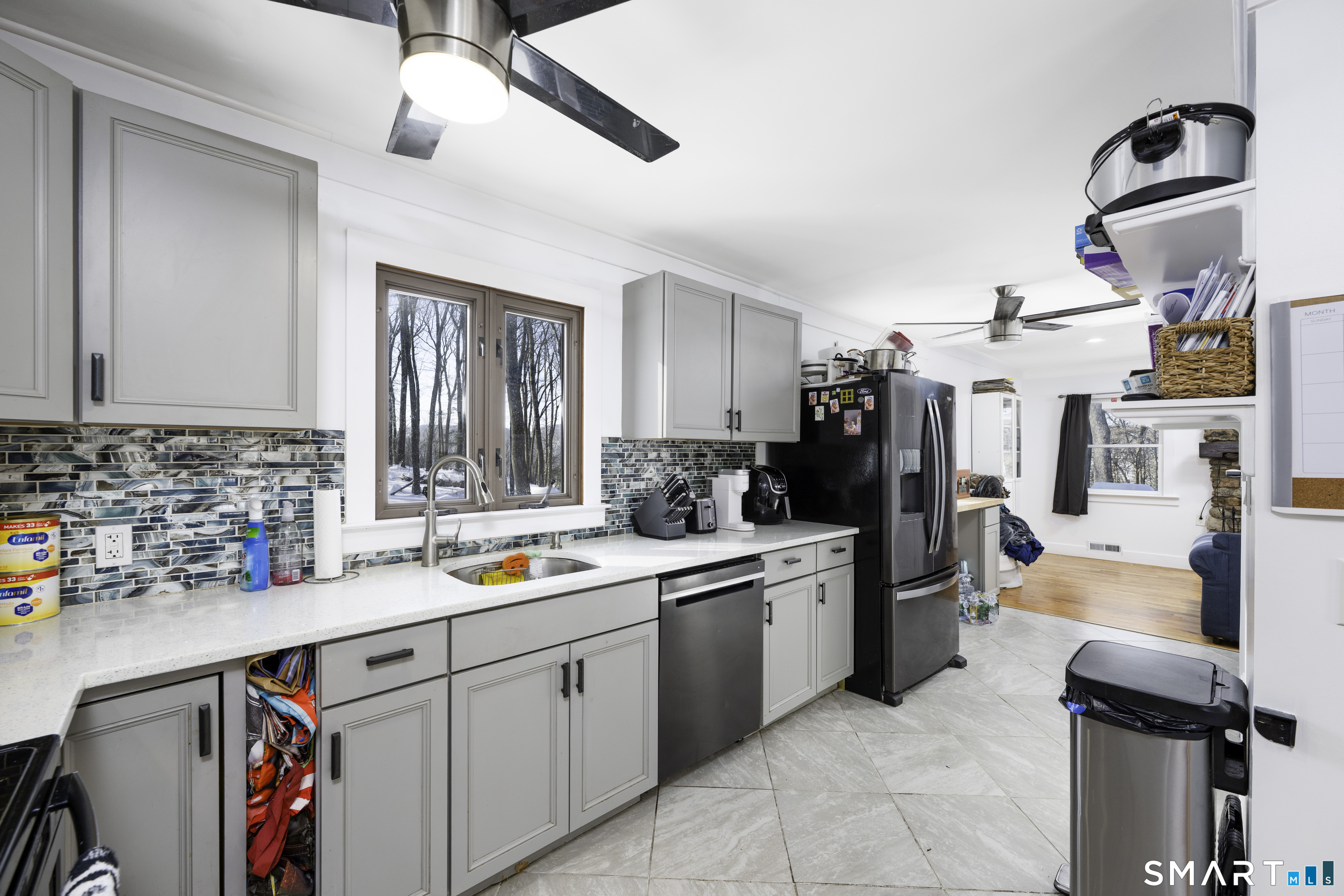 36 Maple Drive New Milford, CT 06776 - Photo 6 of 24 a kitchen with a sink and cabinets