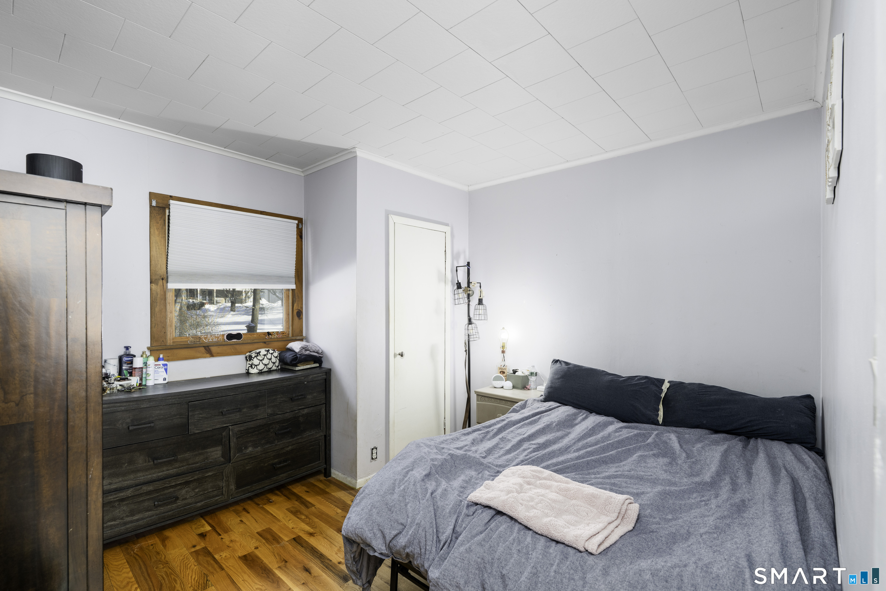 36 Maple Drive New Milford, CT 06776 - Photo 9 of 24 a bedroom with a bed and a dresser