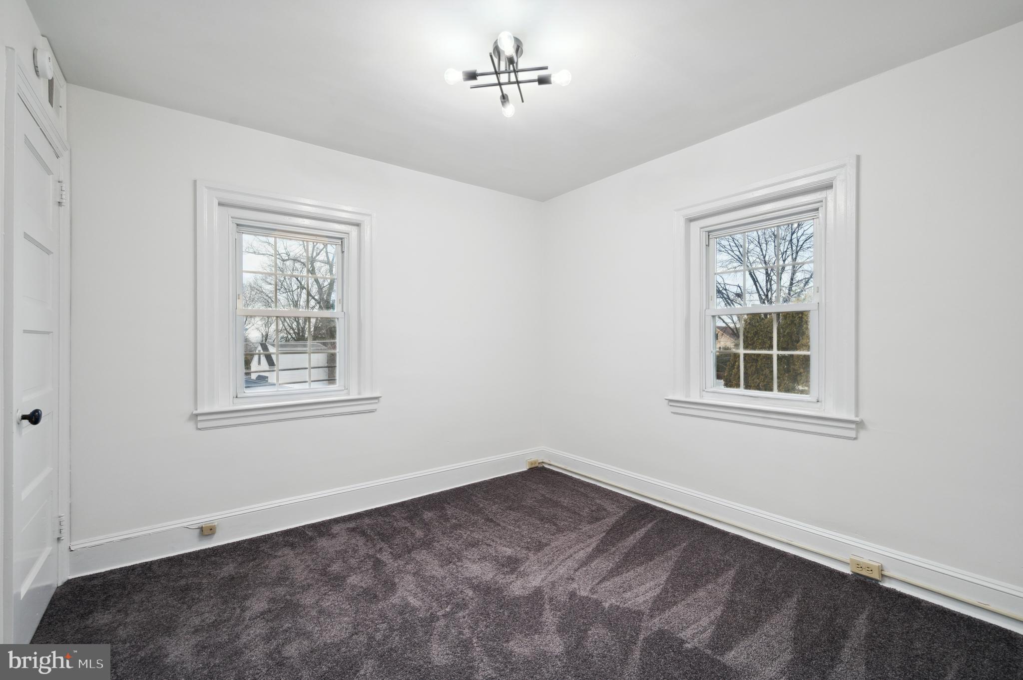 156 Edgemont Avenue Ardmore, PA 19003 - Photo 13 of 15 a view of an empty room with a window
