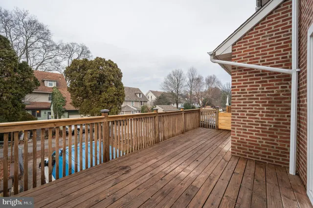a view of balcony with wooden floor